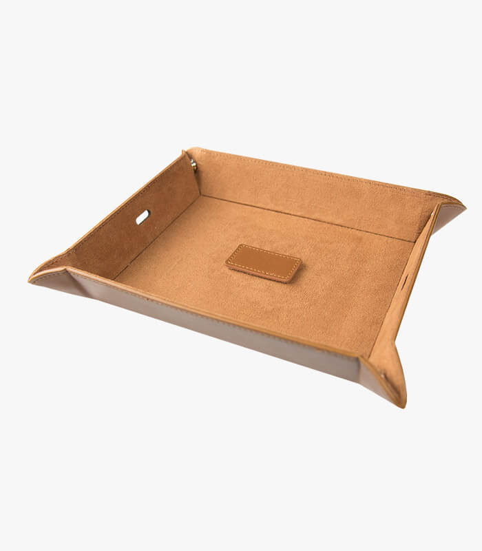 Valet tray is crafted from leather and suede and can be logoed