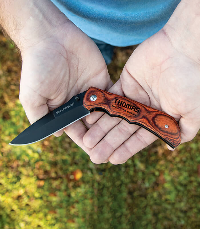 Trigger Rosewood folder knife has a black blade. It can be logoed.