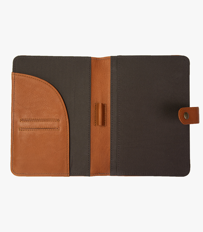 Leather journal open with room for notepad