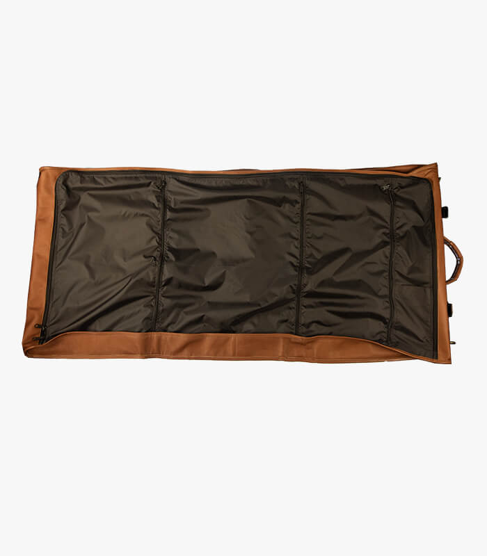 opened leather garment bag with pockets for shoes, ties, socks, and more