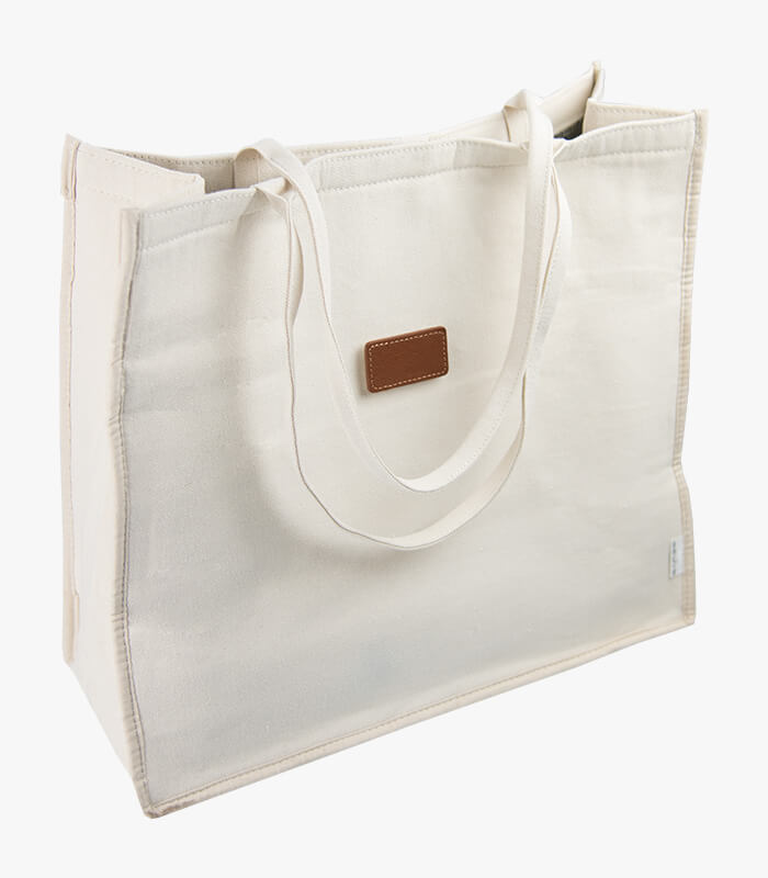 Front of Canvas Beach party tote bag