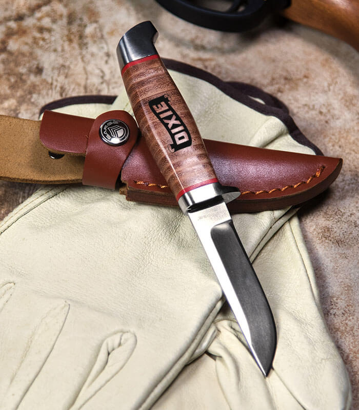 Front of stacked leather fixed blade and sheath engraved with logo