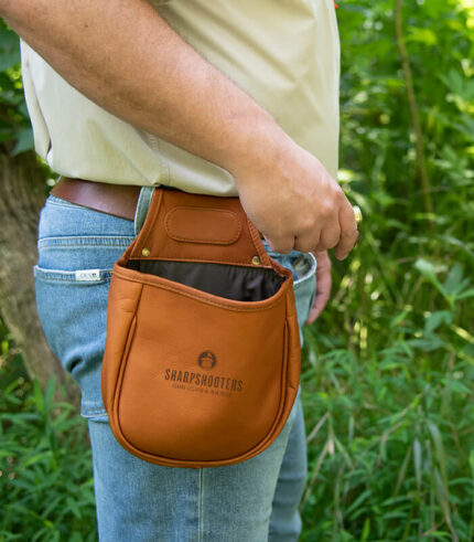 Leather shotgun shell bag on belt loop that can be engraved with logo
