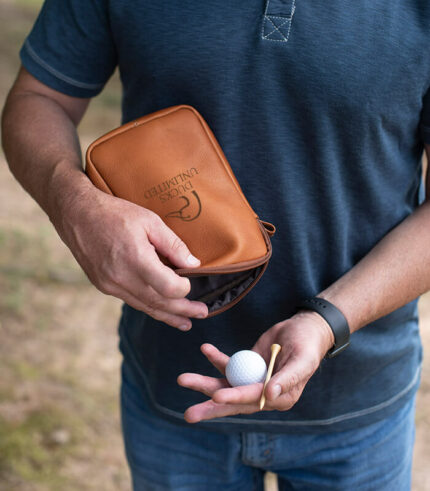 The leather valuables pouch can hold everything from a cellphone, earphones, and chargers